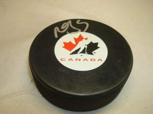 Марк Джордано подписа хокей шайба на националния отбор на Канада с автограф 1Б - за Миене на НХЛ с автограф